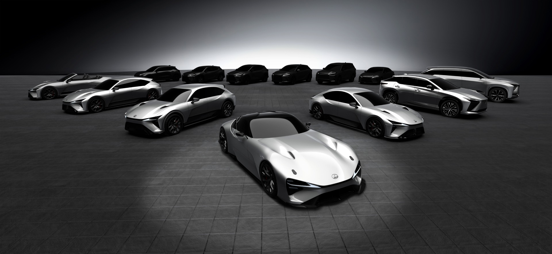 Lexus Electrified Sport Concept models lined up in metallic silver in a studio setting.