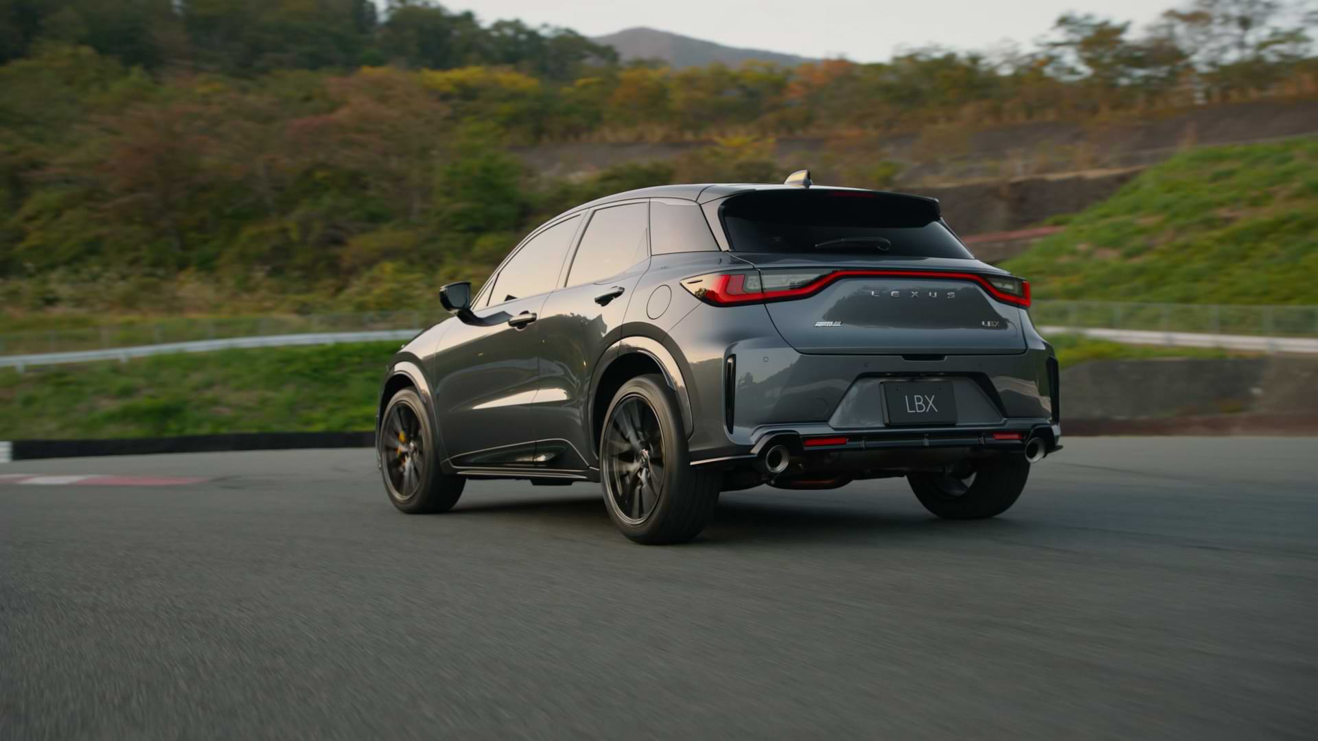 Rear view of the Lexus LBX Morizo RR concept model driving on a road