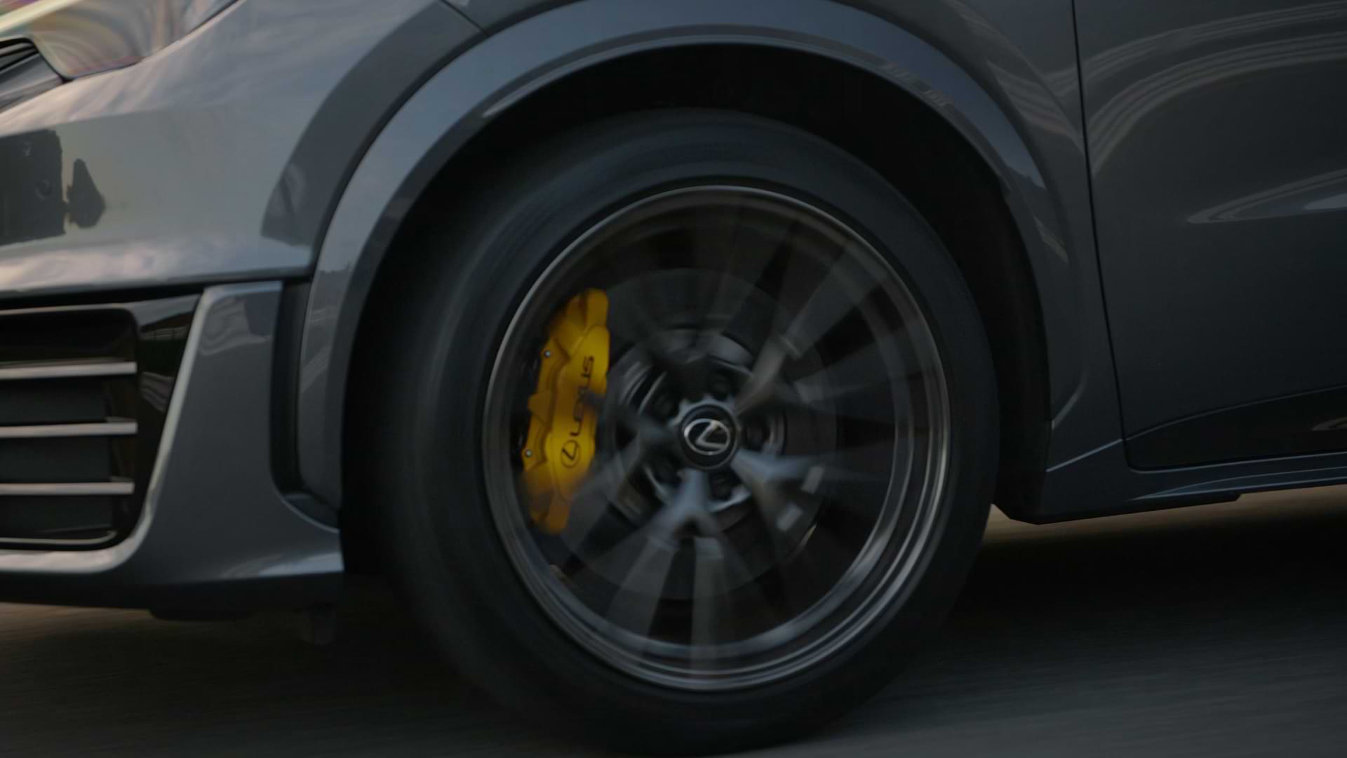 A detail of the wheel of the Lexus LBX Morizo RR with yellow brake caliper