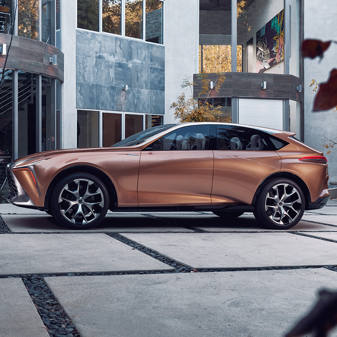 Copper Lexus LF-1 Limitless concept vehicle parked on a driveway