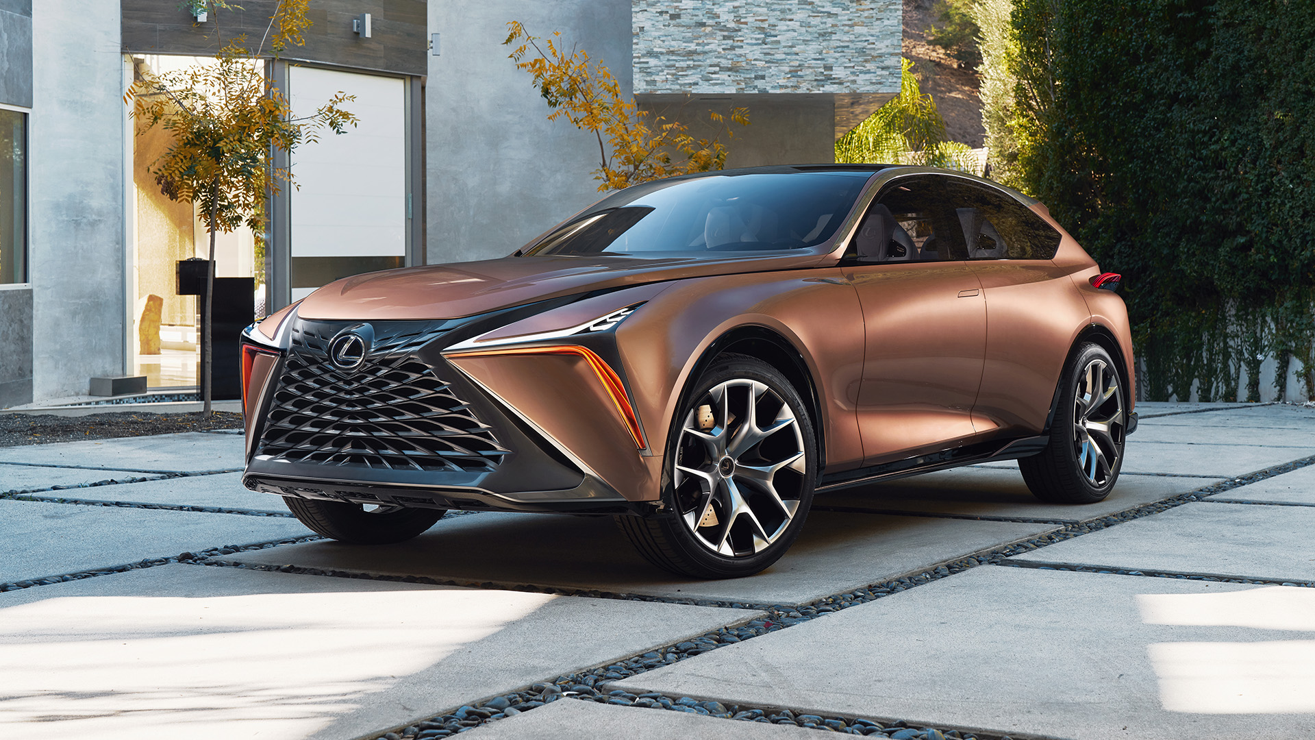 Copper Lexus LF-1 Limitless concept vehicle parked on a driveway