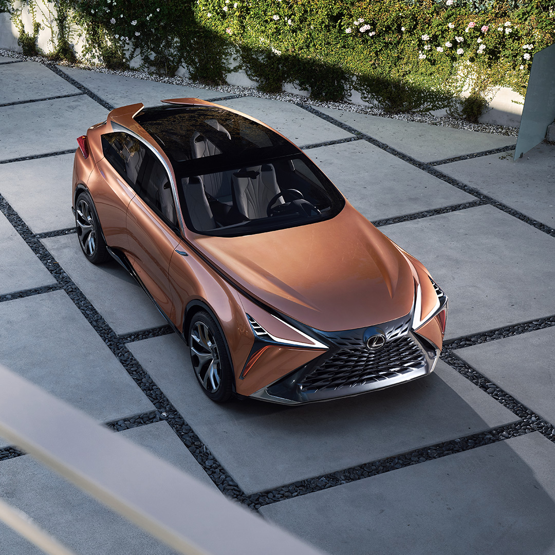 Copper Lexus LF-1 Limitless concept vehicle parked on a driveway viewed from above
