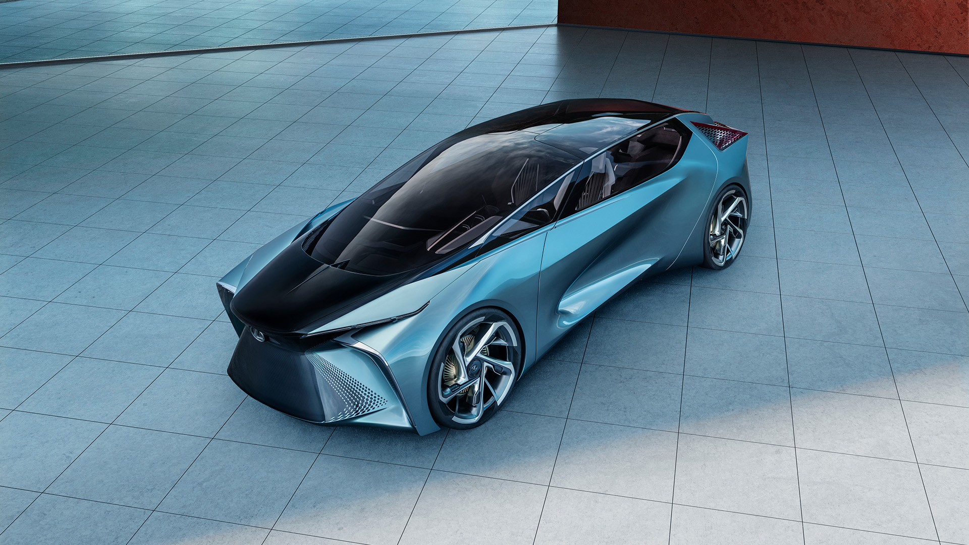 Lexus LF-30 Electrified Concept vehicle in blue parked on a shaded tile ground