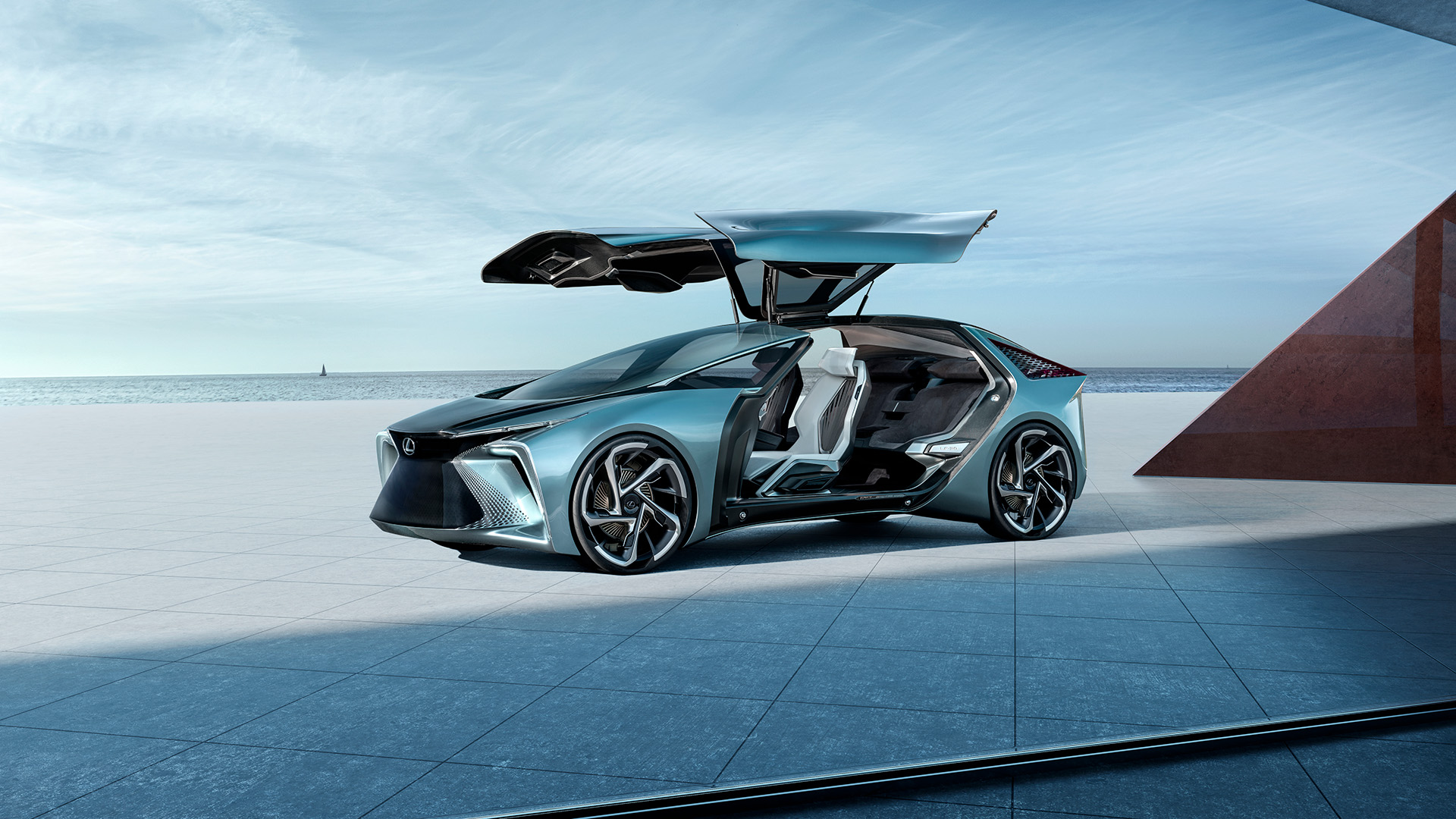 Lexus LF-30 Electrified Concept vehicle in blue parked on a tiled ground with the passenger doors open