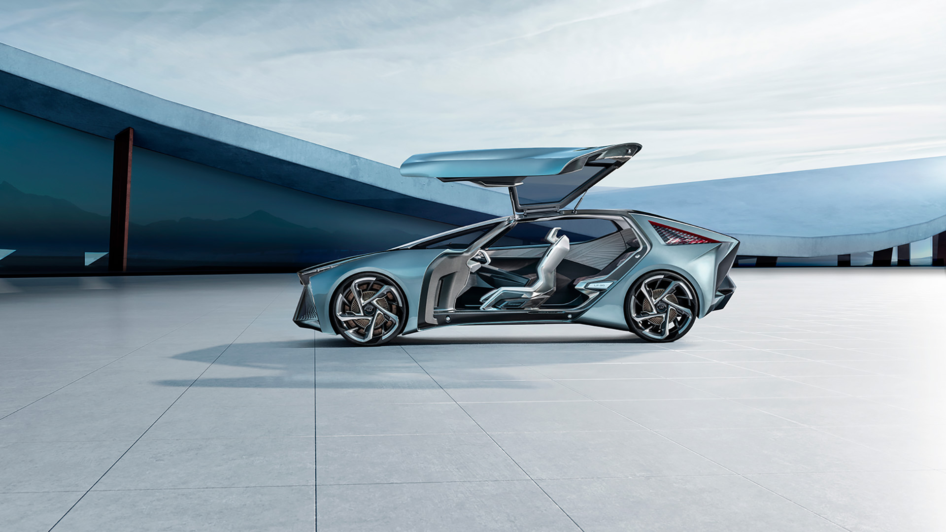 Lexus LF-30 Electrified Concept vehicle in blue parked in front of an architectural building