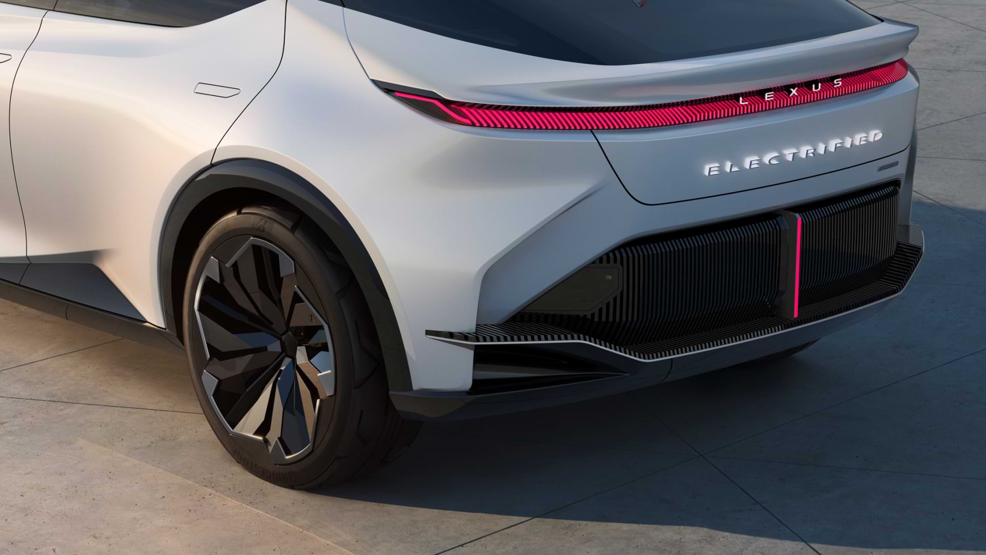 The rear view of a silver Lexus LF-Z Electrified concept vehicle