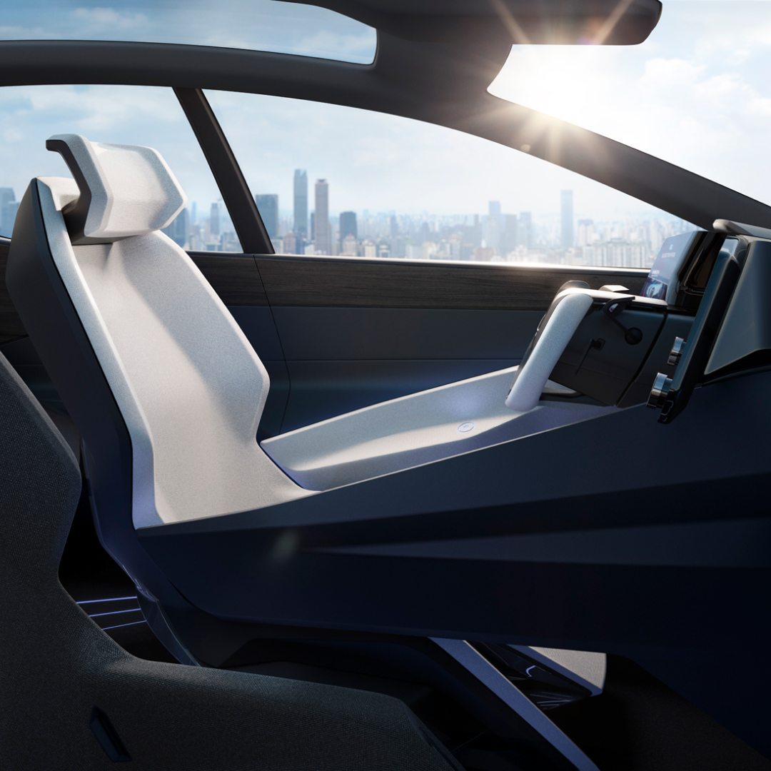 The interior cabin of the Lexus LF-Z Electrified concept vehicle with city in the background.