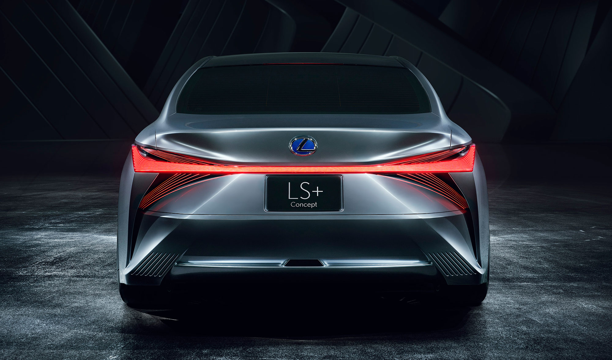Rear view of the Lexus LS+ concept vehicle, with red lights on