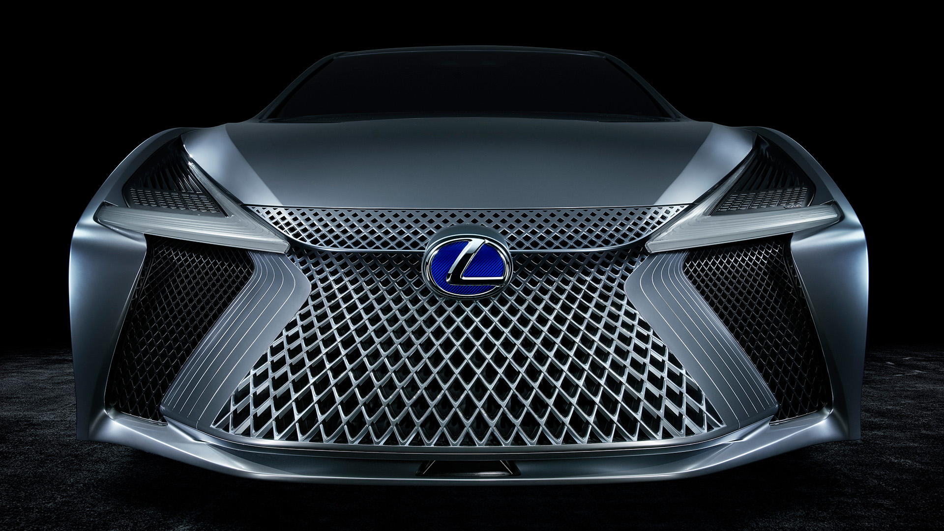 Close-up of the Lexus LS+ concept vehicle grille in a studio setting