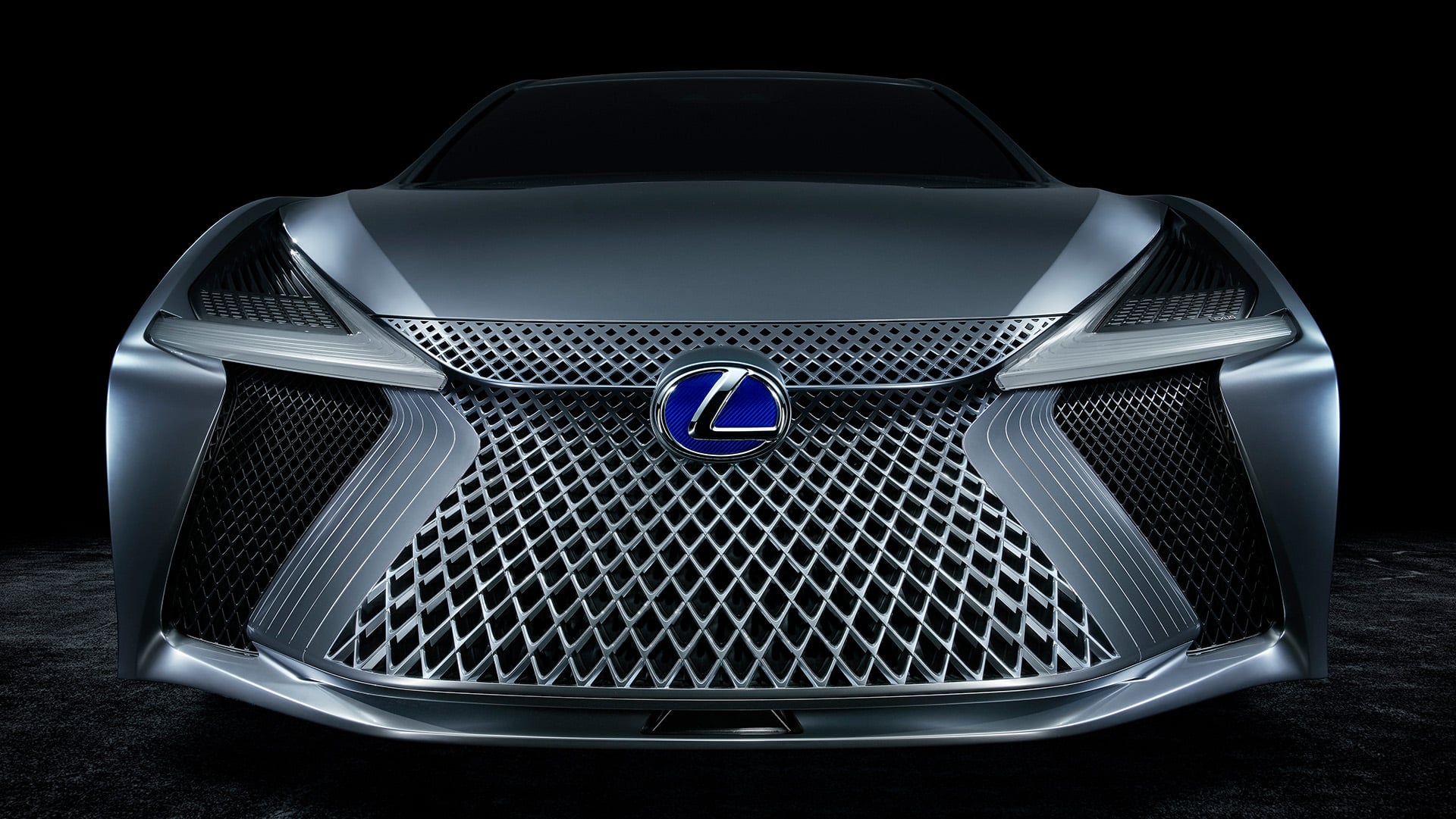 Close-up of the Lexus LS+ concept vehicle grille in a studio setting
