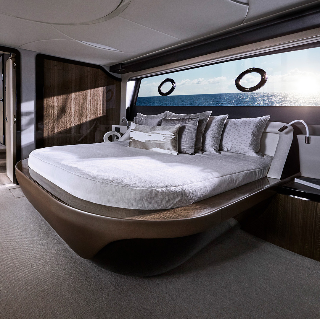 The Lexus LY 650 Yacht concept's luxury interior cabin with bed and windows showing ocean