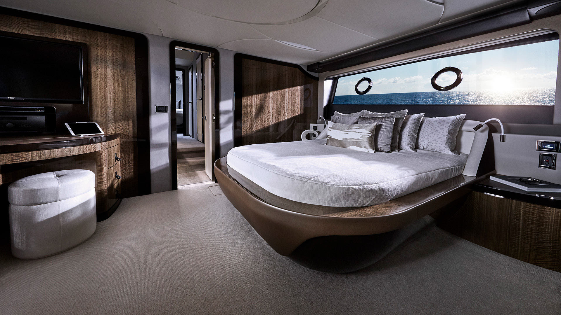 The Lexus LY 650 Yacht concept's luxury interior cabin with bed and windows showing ocean